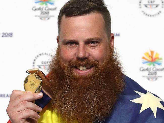 BRISBANE, AUSTRALIA - APRIL 11:  Gold medalist Daniel Repacholi of Australia poses during the medal ceremony for the Men's 50m Pistol Finals on day seven of the Gold Coast 2018 Commonwealth Games at Belmont Shooting Centre on April 11, 2018 in  Brisbane, Australia.  (Photo by Phil Walter/Getty Images)