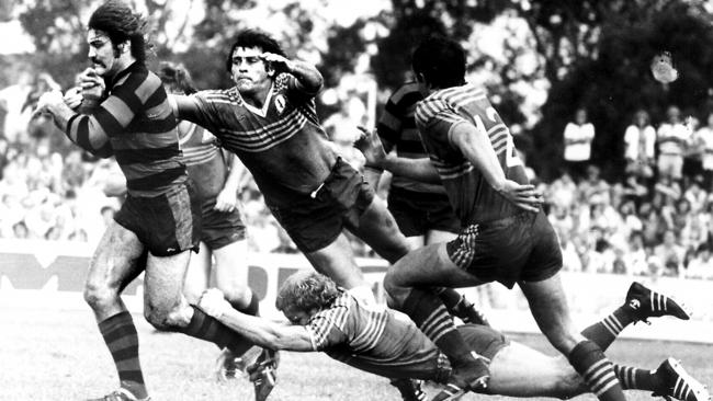 Healey crashes through the Parramatta defence in 1977.