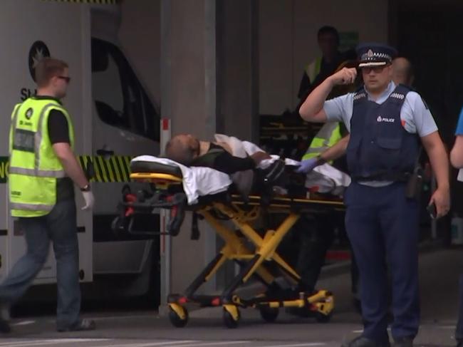 A victim arriving at a hospital following the mosque shooting in Christchurch. Picture: TV New Zealand via AFP