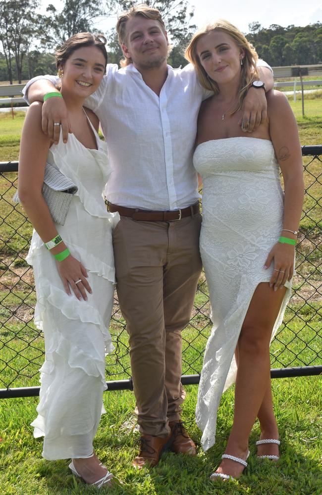 Lara Lloyd-Jones, Kain Schultz and Isabelle Wallace at the Yeppoon Turf Club's Derby Day races at Keppel Park Racecourse on November 2, 2024.