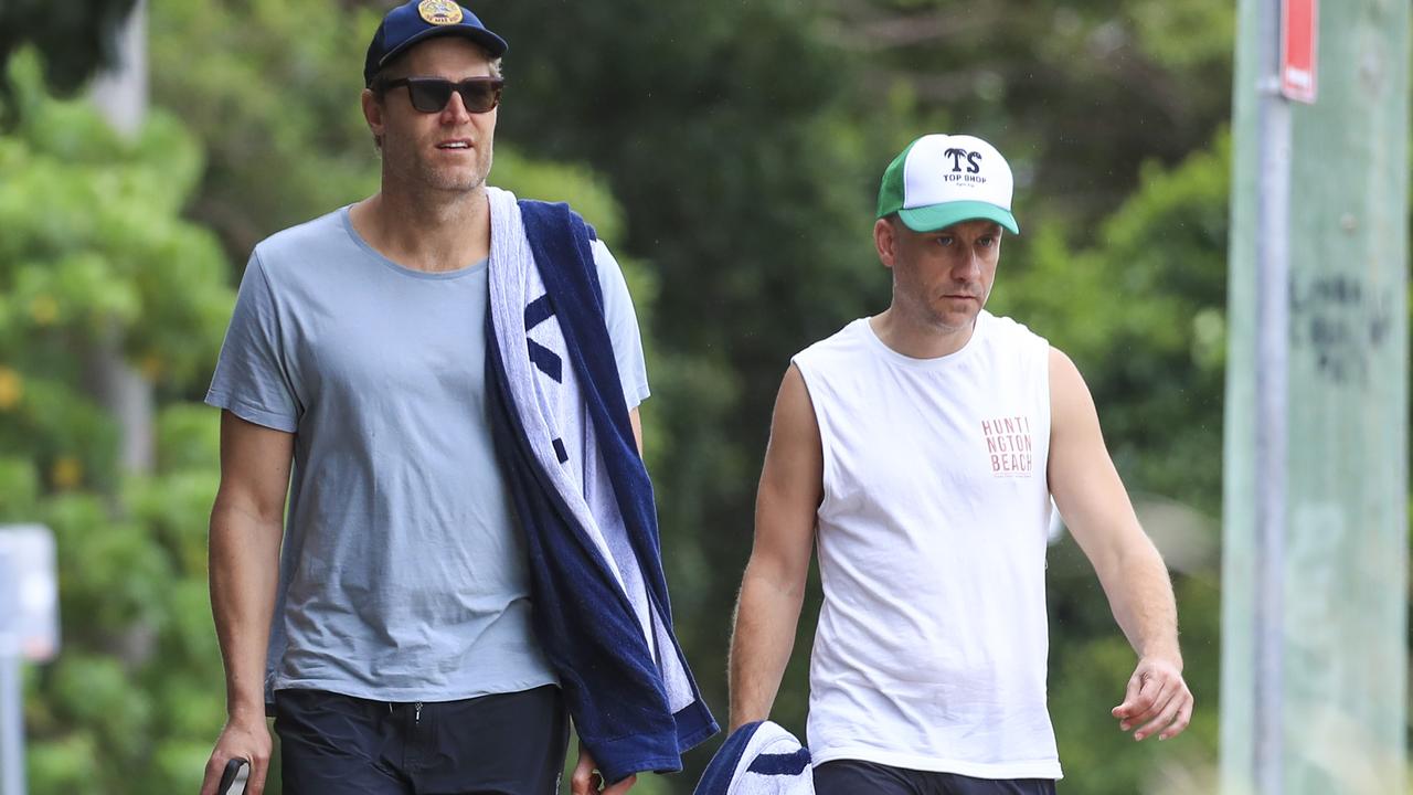 Walker kept his head down during the stroll. Picture: Media Mode.