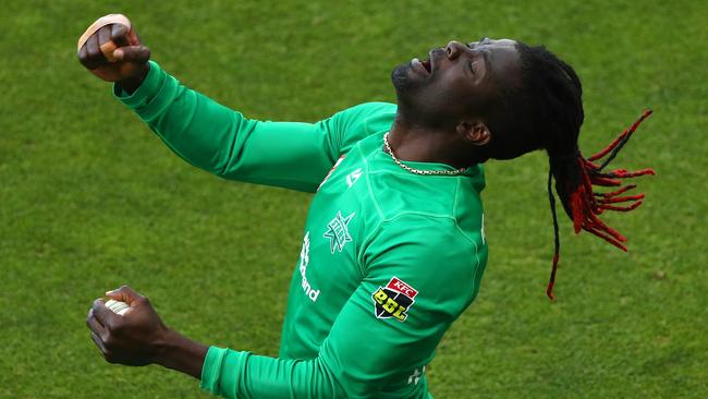 Andre Fletcher of the Stars celebrates taking a catch to dismiss Ben McDermott of the Hurricanes during the Big Bash League match between the Melbourne Stars and the Hobart Hurricanes at Blundstone Arena, on January 04, 2021, in Hobart, Australia. (Photo by Robert Cianflone/Getty Images)