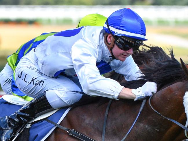 MELBOURNE, AUSTRALIA - JANUARY 26:  Jamie Kah riding Streetcar Stranger winning Race 4, the Ive Print W.j. Adams Stakes,  during Melbourne Racing at Caulfield Racecourse on January 26, 2022 in Melbourne, Australia. (Photo by Vince Caligiuri/Getty Images)