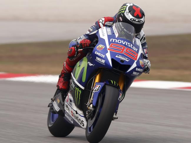 MotoGP rider Jorge Lorenzo of Spain rides his Yamaha during the second free practice session for Sunday's Malaysian Motorcycle Grand Prix at Sepang International Circuit in Sepang, Malaysia, Friday, Oct. 23, 2015. (AP Photo/Lai Seng Sin)