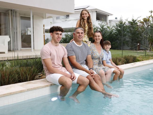 WEEKEND TELEGRAPH 16TH FEBRUARY 2024Pictured at their home at Greenhills Beach near Cronulla is Paul and Cynthia Cavallaro with their kids Riccardo (19), and Ciera (10) and Lucas (11).They are selling their property which they designed and added a pool to. 'swimming pool' was the top search term home seekers use on realestate.com when looking to buy a property.  Picture: Richard Dobson