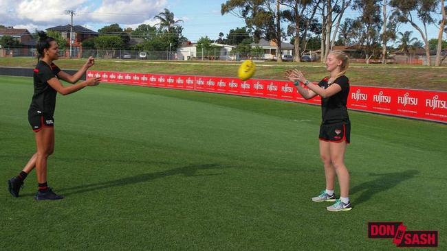 Michaela Long and Stephanie Hird warm up. Picture: Essendon FC Facebook