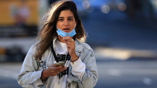 SYDNEY, AUSTRALIA - NewsWire Photos AUGUST 06, 2021 - A woman with a mask in Sydney.Picture: NCA NewsWire / Christian Gilles