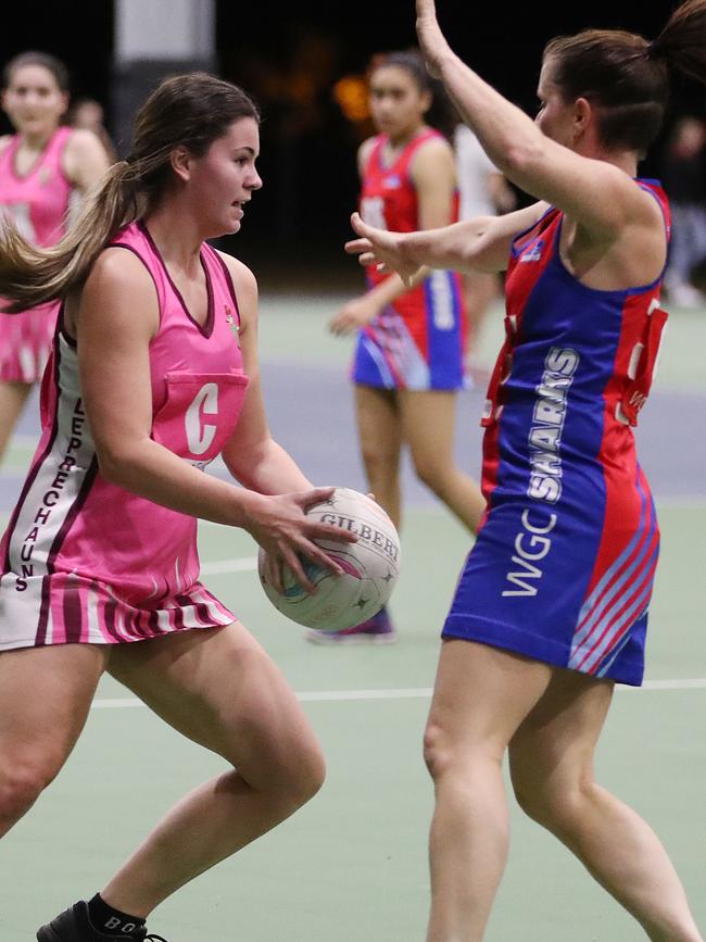 Lily Munro and Renee Croxford face off in the Cairns Netball match between Brothers Leprechauns and The GWS Sharks. PICTURE: BRENDAN RADKE.