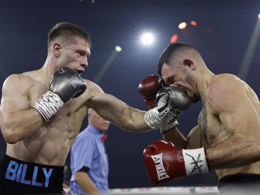 Billy Polkinghorn connects with Jordan Kasilieris at the No Limit Boxing fight night at WIN Entertainment Centre on July 10, 2024. Pictures: No Limit Boxing/Gregg Porteous