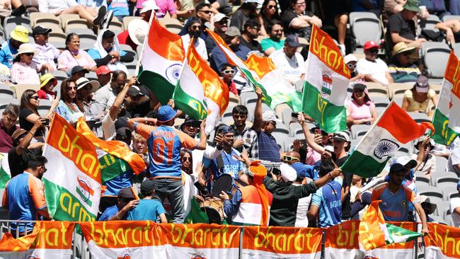 PERTH, AUSTRALIA - NOVEMBER 23: Indian fans show their support during day two of the First Test match in the series between Australia and India at Perth Stadium on November 23, 2024 in Perth, Australia. (Photo by Robert Cianflone/Getty Images)