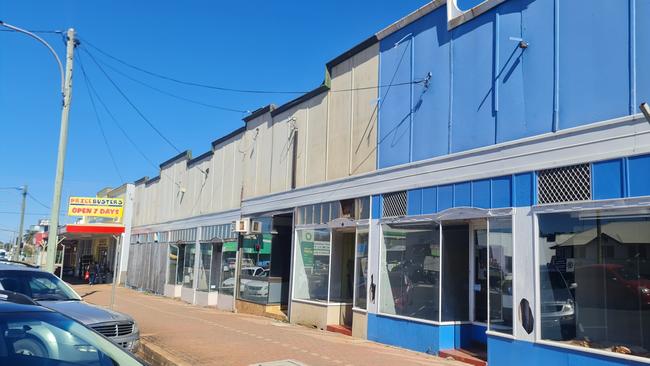 Vacant shop buildings on Kingaroy St, Kingaroy. A teenager was dealt with under the Youth Justice Act on June 26, 2022, after grass fires were lit behind the buildings causing minor damage.