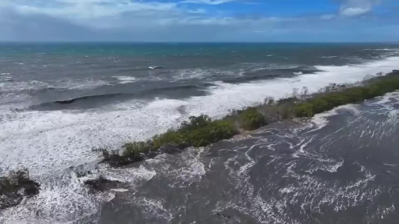 Bribie Island smashed by waves ahead of TC Alfred