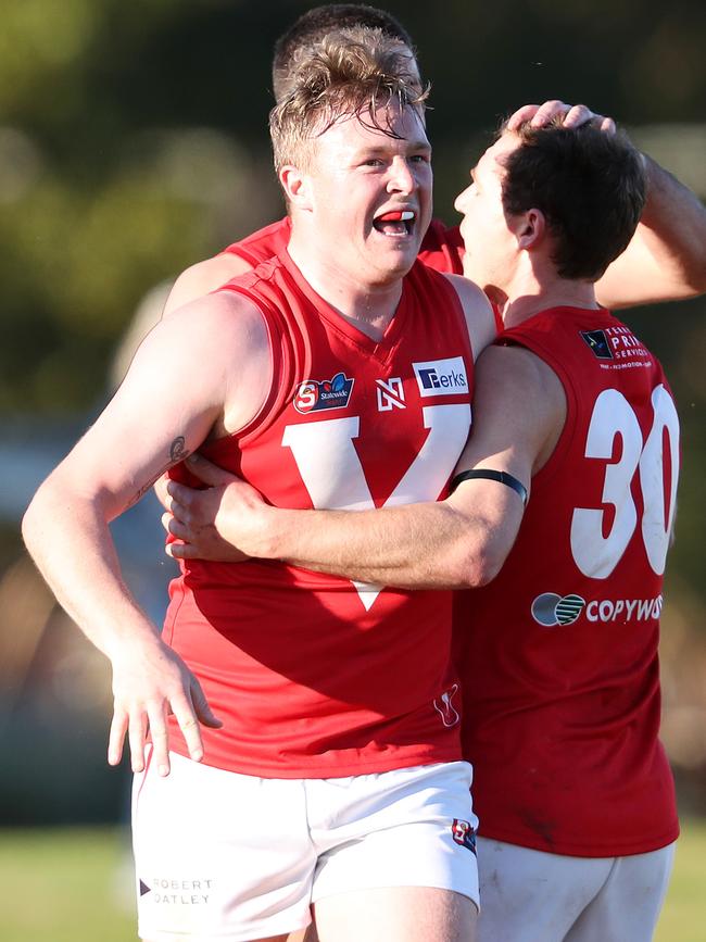 Ex-Rooster Chris Barns is also an assistant coach at the Roos. Picture: Sarah Reed