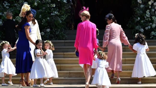 Jessica and her daughter Ivy, one of the flower girls, at Meghan and Harry’s wedding. Picture: Ben Stansall/WPA Pool/Getty Images