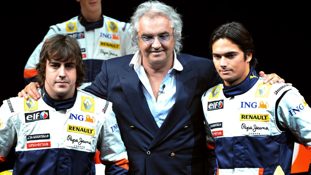 Fernando Alonso and Nelson Piquet Jr with Renault F1 team boss Flavio Briatore. Photo: AFP PHOTO/BERTRAND GUAY