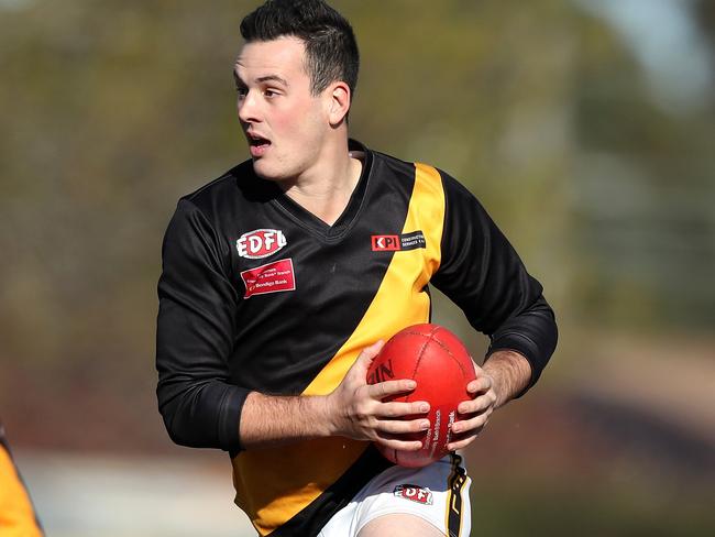 Jarrod Petersen of Westmeadows runs out of the centre during the EDFL football match between East Keilor and Westmeadows played at Overland Reserve Keilor on Saturday 20th July, 2019