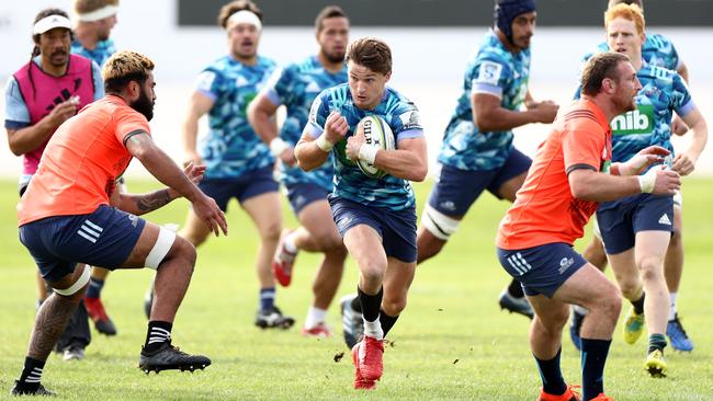 Beauden Barrett runs through drills during a Blues training session in Auckland on Friday. Picture: Getty Images