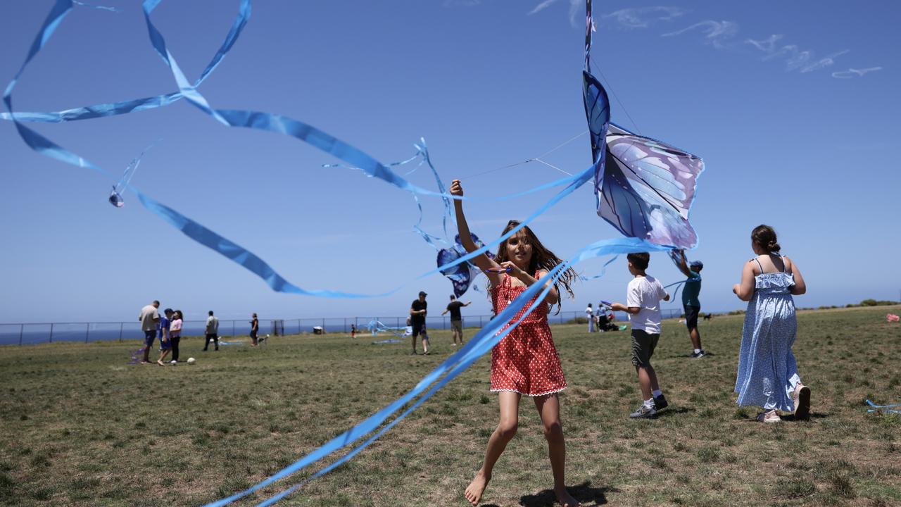 Nine-year-old Juliette Gavshon flies a kite at Rodney Reserve in Sydney on Sunday, November 19. Members of the Jewish community gathered at Dover Heights to fly kites as part of the Bring Them Home campaign calling for the release of children kidnapped by Hamas. Picture: NCA NewsWire / Dylan Robinson