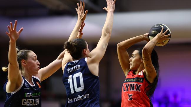 Geelong’s Alex Sharp and Gemma Potter double team Perth’s Ally Wilson. Picture: Mike Owen/Getty Images