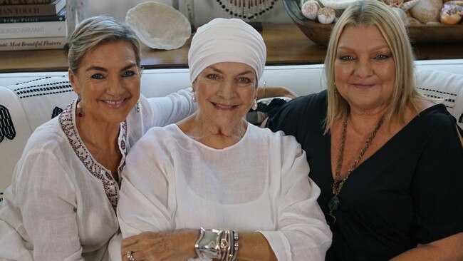 Tabberer women on couch: Maggie Tabberer with daughters Amanda. left, and Brooke, right.