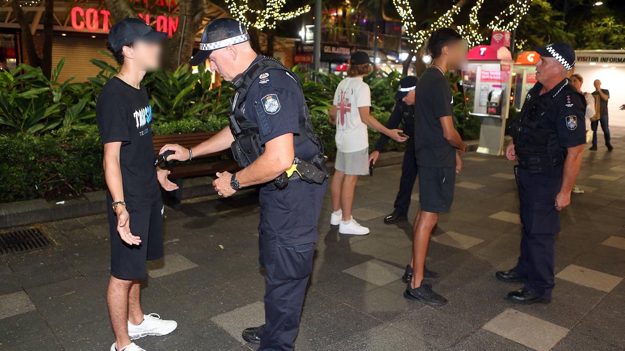 Police in Surfers Paradise 'wanding' revellers for knives. Picture: Richard Gosling