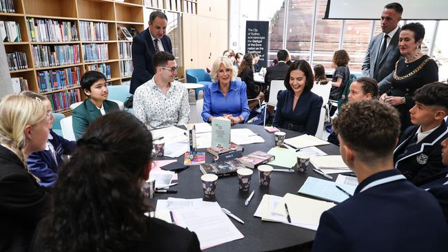 Queen Camilla (C) talks with students during a visit to the Green Square Library on October 22, 2024 in Sydney. Picture: David Gray-Pool/Getty Images