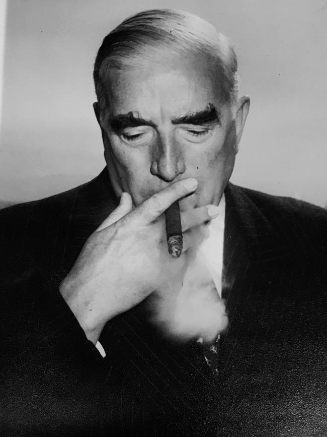 Robert Menzies smoking a cigar