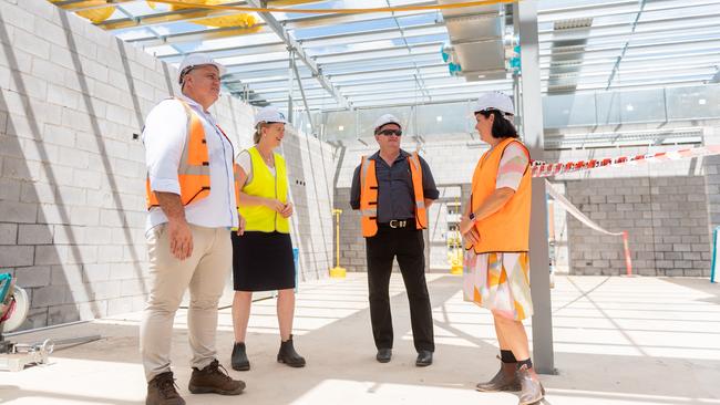 Police Minister Nicole Manison and Nightcliff MLA Natasha Fyles raising the roof at the under-construction 24-hour police station in Nightcliff as part of the John Stokes Redevelopment. Picture: Che Chorley