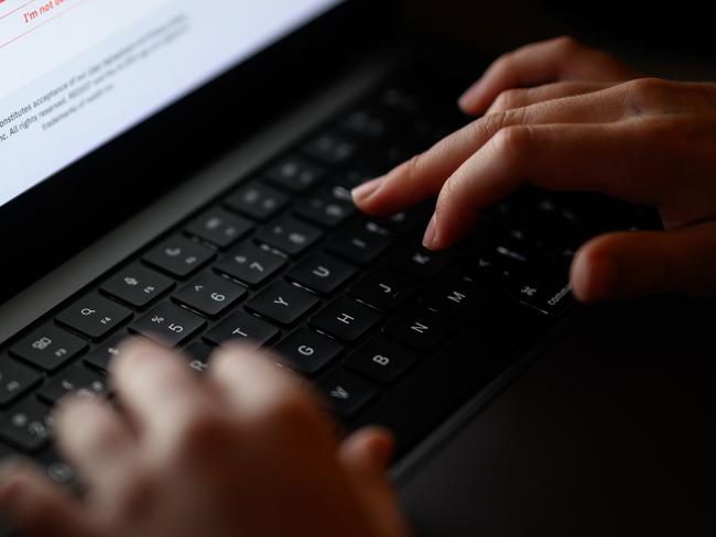 LONDON, ENGLAND - JANUARY 17: In this photo illustration, a teenage child looks at a screen of age-restricted content on a laptop screen on January 17, 2023 in London, England. The Bill aims to protect young and vulnerable viewers by introducing new rules for social media companies which host user-generated content, and for search engines, which will have tailored duties focussed on minimising the presentation of harmful search results. Content that platforms will need to remove includes child sexual abuse material, revenge pornography, selling illegal drugs or weapons, and terrorism. (Photo by Leon Neal/Getty Images)