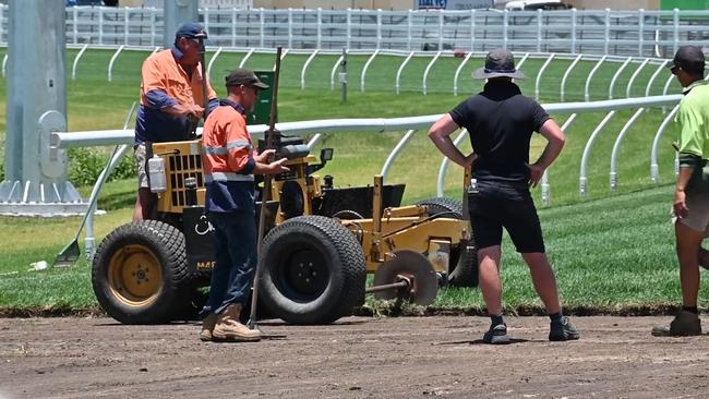 Work underway last week to remove the poisoned section of track at the Gold Coast Turf Club and replace it before the Magic Millions, which was subsequently washed out. Picture: Supplied