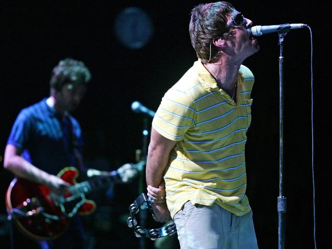 Liam (right) and Noel Gallagher perform with Oasis at Castellon, Spain, in August 2005. Picture: Jose Jordan / AFP
