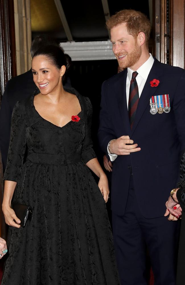 The Sussexes dazzle onlookers as they arrive at the annual Royal British Legion Festival of Remembrance at the Royal Albert Hall. Picture: Getty Images