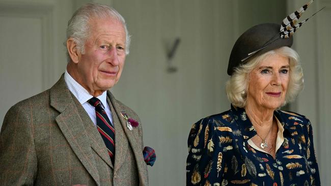 Britain's King Charles III and Britain's Queen Camilla attend the annual Braemar Gathering in Braemar, central Scotland, on September 7, 2024. The Braemar Gathering is a traditional Scottish Highland Games which predates the 1745 Uprising, and since 1848 it has been regularly attended by the reigning Monarch and members of the Royal Family. (Photo by ANDY BUCHANAN / AFP)