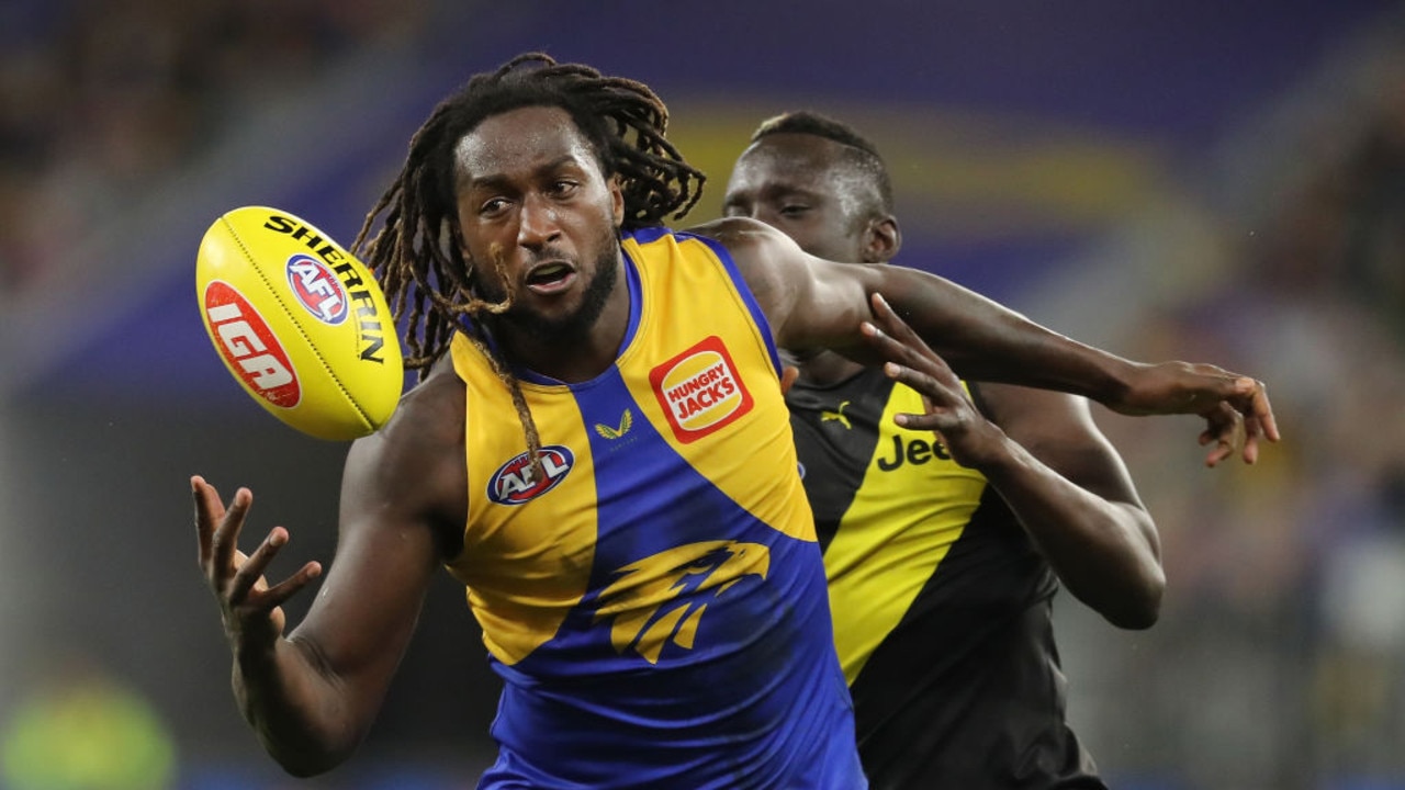 PERTH, AUSTRALIA - JUNE 13: Nic Naitanui of the Eagles contests a ruck with Mabior Chol of the Tigers during the 2021 AFL Round 13 match between the West Coast Eagles and the Richmond Tigers at Optus Stadium on June 13, 2021 in Perth, Australia. (Photo by Will Russell/AFL Photos via Getty Images)