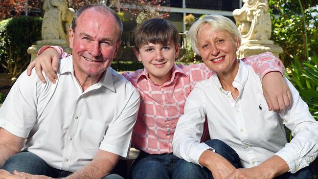 Martin Hamilton-Smith and his wife Stavroula Raptis flank their son Thomas at their Stirling home. Picture: Tom Huntley