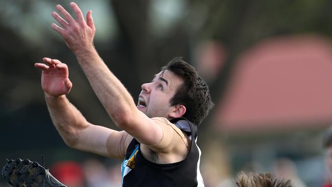 Jacob Yeomans of St Mary's marks over Tait Forster of Panton Hill during NFL Division 3 grand final: St Mary's v Panton Hill on Saturday, September 8, 2018, in Whittlesea, Victoria, Australia. Picture: Hamish Blair