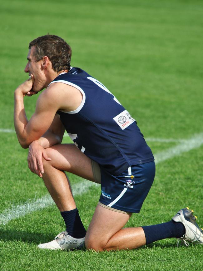 Kerang coach Troy Coates plots a move during the Central Murray league grand final win against Balranald.