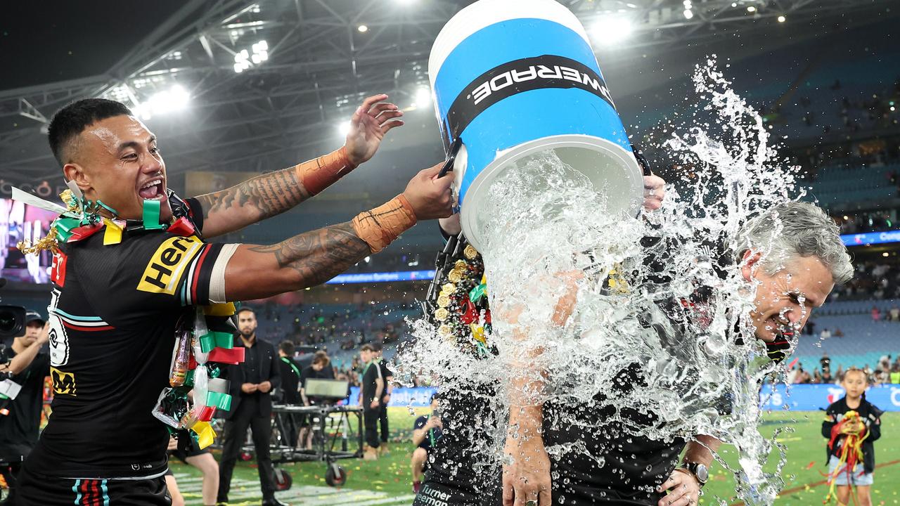 Spencer Leniu tips a bucket of water over winning coach Ivan Cleary. Picture: Getty Images