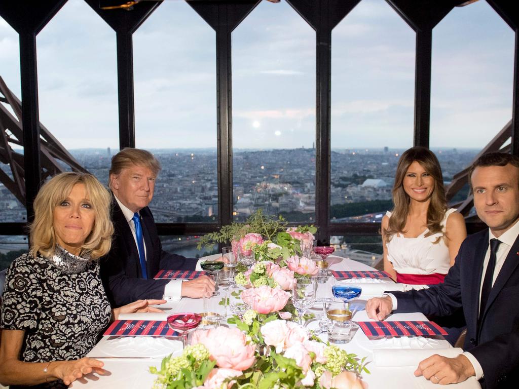 It’s not all candlelit dinners between Trump and Macron. Pictured, the first couples in July 2017. Picture: AFP PHOTO / SAUL LOEB