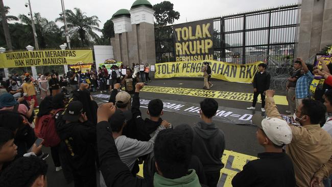 A number of activist for human rights hold a demonstration at the front parliament building against draft criminal code in Jakarta, Indonesia on December 5. Picture: Getty.