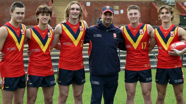 The SA under-16 state team leadership group, from left, North Adelaide’s Sam Cumming, Sturt’s Noah Roberts-Thomson, Central District’s Dyson Sharp (captain), coach Julian Farkas, North’s Blake Oudshoorn-Bennier (vice-captain) and the Eagles’ Jack Cook. Picture: Peter Argent/SANFL.