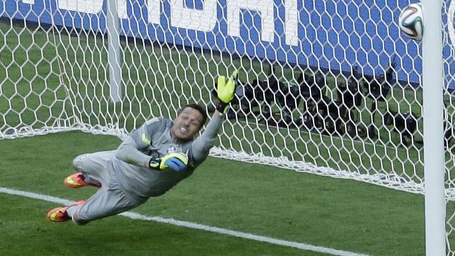 Julio Cesar has the inside of the post to thank for this penalty miss.