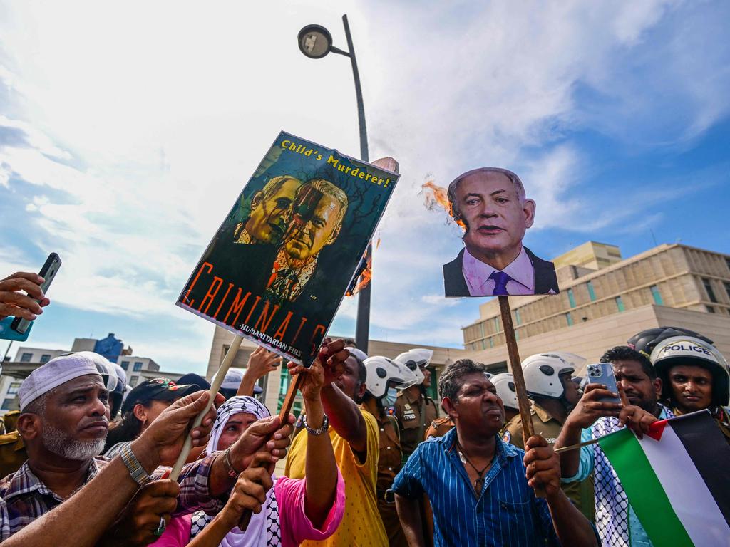 Activists burn an image of Netanyahu in Colombo last month. Picture: Ishara S. Kodikara / AFP
