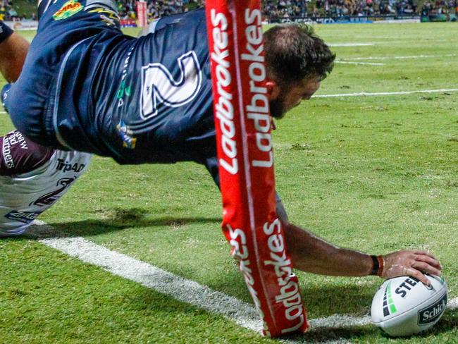 Kyle Feldt of the Cowboys scores a try during the Round 13 NRL match between the North Queensland Cowboys and the Manly Warringah Sea Eagles at 1300SMILES Stadium in Townsville, Saturday, June 8, 2019. (AAP Image/Michael Chambers) NO ARCHIVING, EDITORIAL USE ONLY