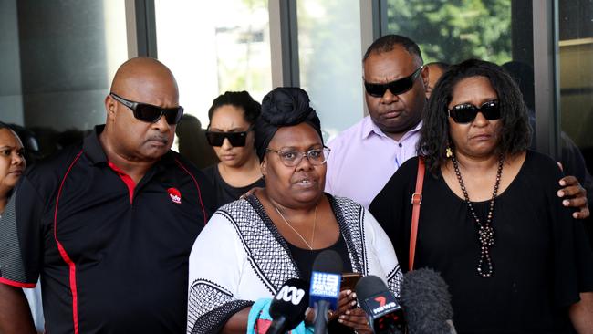 Meeky's family including mum Muriel Namok, centre, speaking to media outside the Cairns Court following the sentencing of former daycare centre director Michael Glenn Lewis. Picture: Stewart McLean