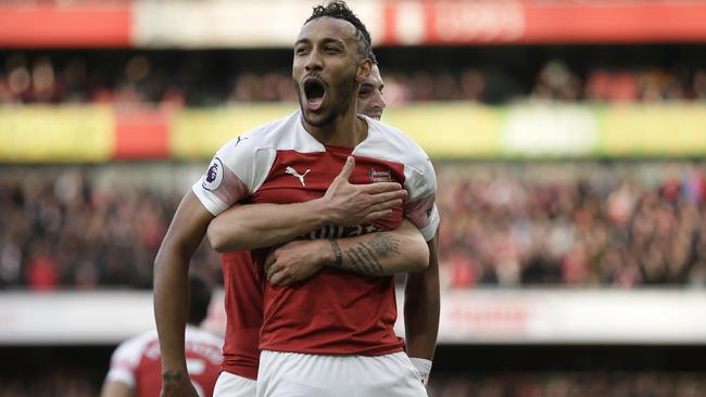 Arsenal's Pierre-Emerick Aubameyang celebrates after scoring against Tottenham. Picture: AP