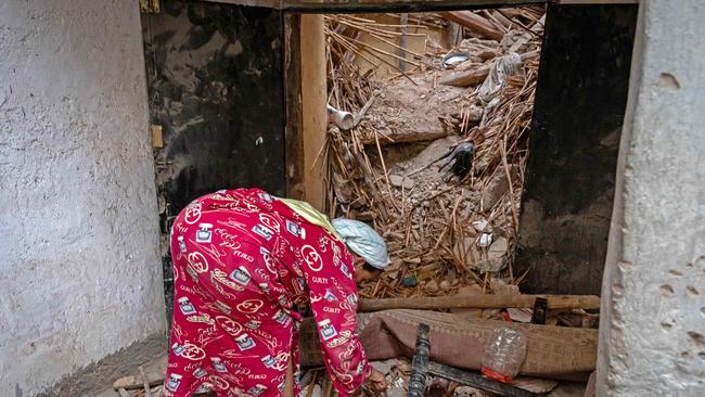 A woman inspects the damage following a 6.8-magnitude quake in Marrakesh. Picture: AFP