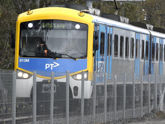 MELBOURNE, AUSTRALIA - NewsWire Photos NOVEMBER 04, 2021: A Metro train runs on the existing track next to the rail duplication project at the Cranbourne rail line in Melbourne's outer south-east. Picture: NCA NewsWire / Andrew Henshaw