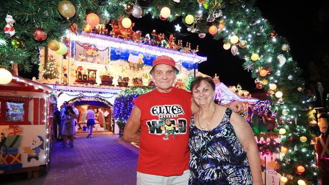 Peter and Lauraine Overton pictured at the front of their home. Picture: Christian Gilles