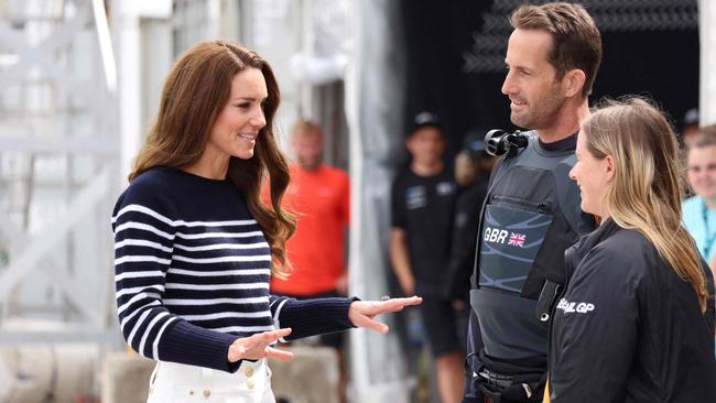 Britain's Catherine, Duchess of Cambridge, meets members of the British and New Zealand teams before boarding on the F50 foiling catamaran. Picture: AFP